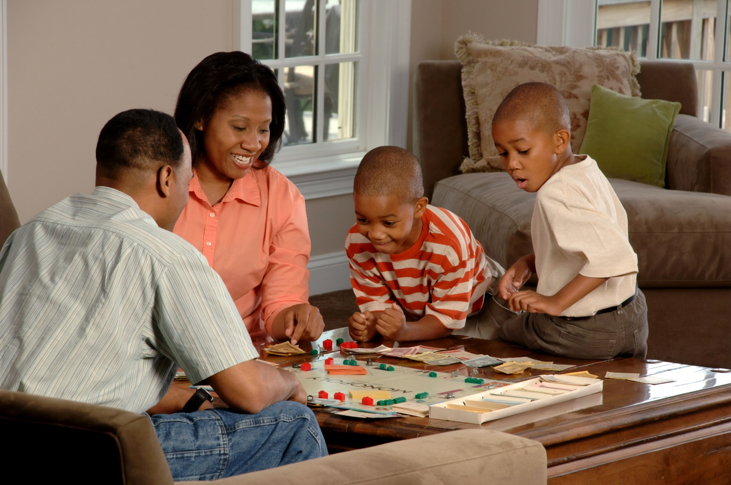 A family playing a board game at home