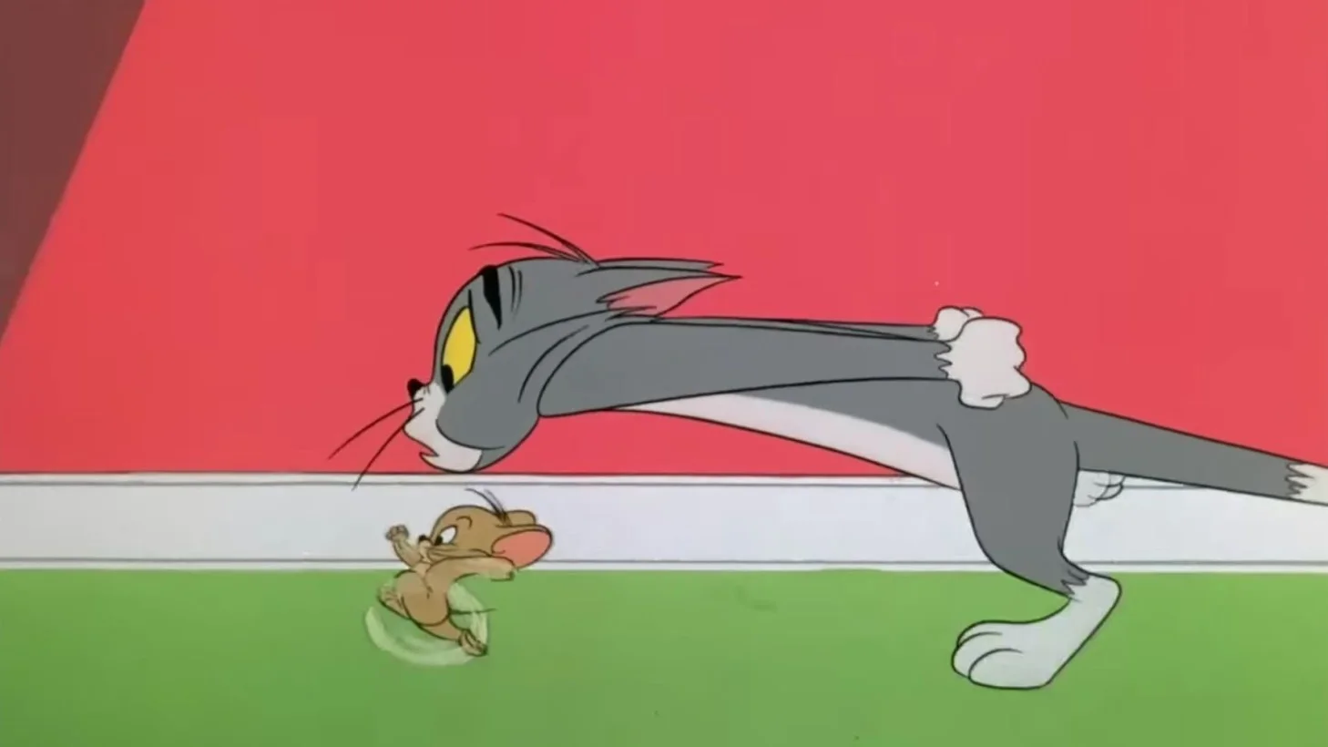 An animated image featuring Tom, a large grey cat, and Jerry, a small brown mouse, from the classic cartoon "Tom and Jerry."